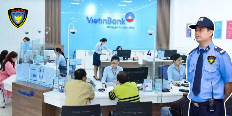 Dịch vụ bảo vệ ngân hàng Bách Thắng | An ninh, Uy tín 24/7 1 Nhân viên bảo vệ Bách Thắng đứng chốt tại sảnh chi nhánh ngân hàng trong trang phục nghiêm chỉnh